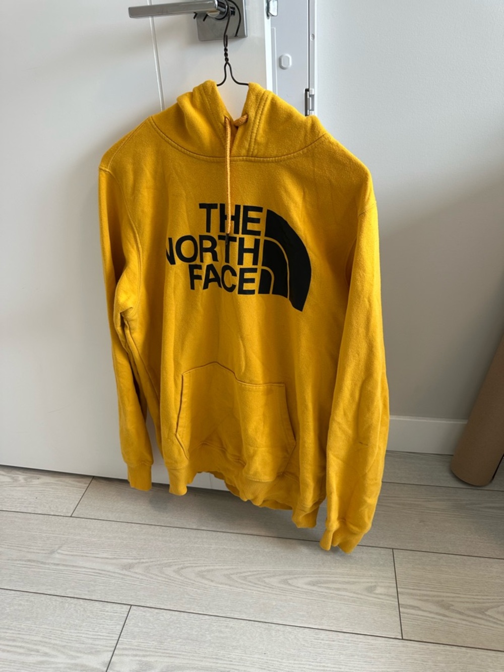 The North Face Men’s Yellow Pullover Hoodie with Black Logo